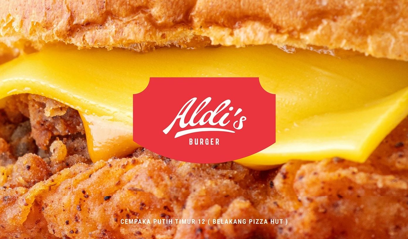 Aldi's Burger Visual Identity — 첫 장. 튀긴 패티와 녹은 치즈 위에 빨간 배지 로고